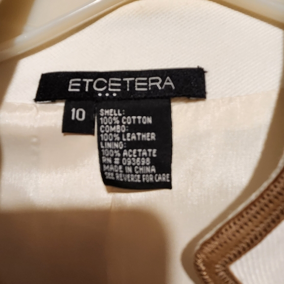 Cream jacket with tan trim. Thigh length. - Picture 4 of 4